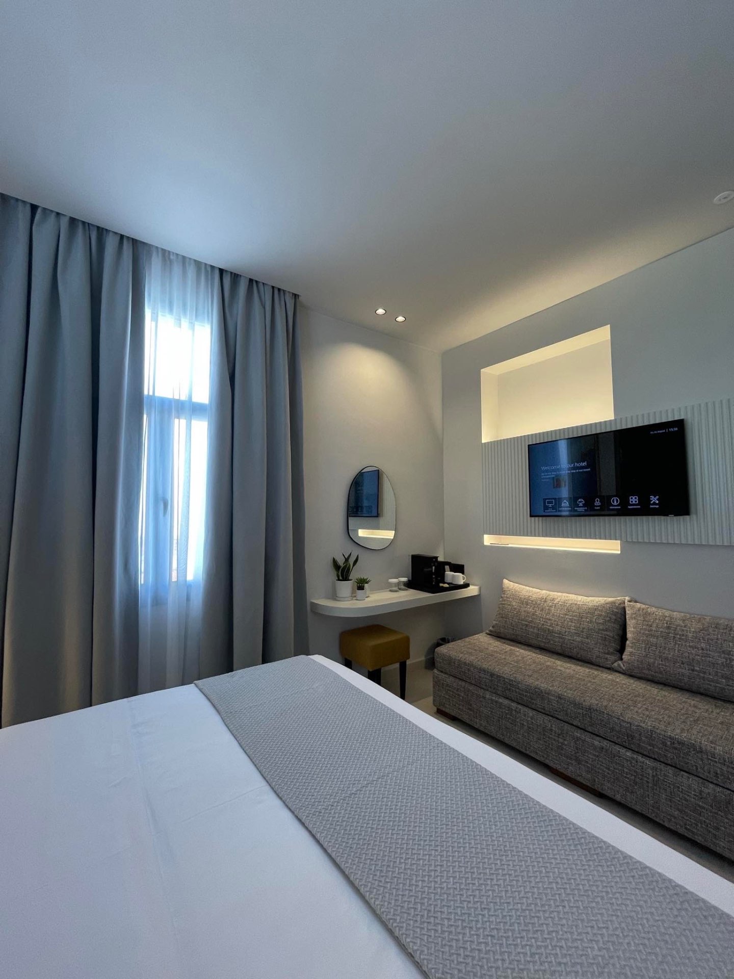 Deluxe Room with Extra Bed — Illy coffee corner and smart TV welcome screen